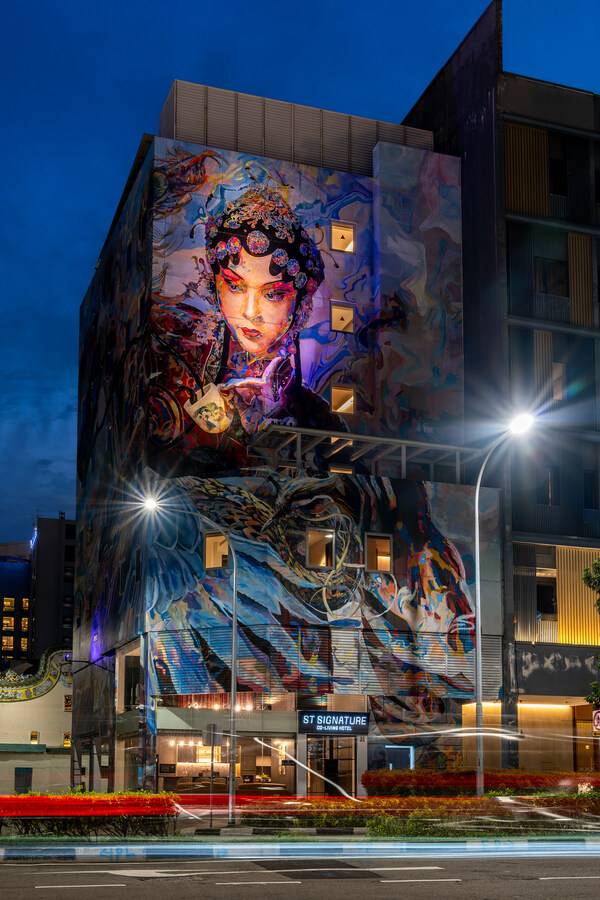 ST Signature Bugis Middle features a vibrant hand-painted wall mural across the entire building's facade.