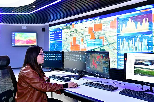 A staff member works at the low-altitude flight service center in Binzhou, east China's Shandong Province, Oct. 9, 2024. (Xinhua/Guo Xulei)