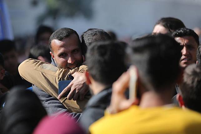 Released Palestinian prisoners are welcomed upon arrival in the southern Gaza Strip city of Khan Younis, Feb. 15, 2025. (Photo by Marwan Dawood/Xinhua)