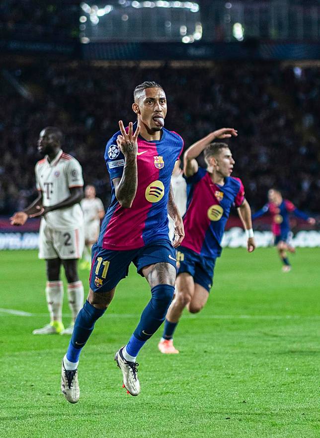 Raphinha (front) of FC Barcelona celebrates his hat-trick during the third round match of UEFA Champions League against Bayern Munich in Barcelona, Spain, Oct. 23, 2024. (Photo by Joan Gosa/Xinhua)