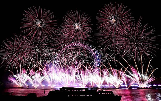 Fireworks explode over the London Eye in London, Britain, Jan. 1, 2025. (Xinhua/Li Ying)