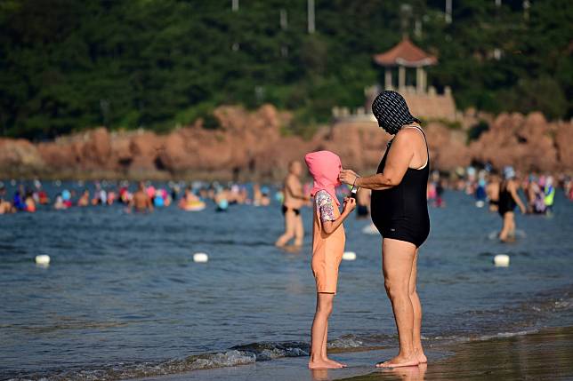 She Invented the Facekini, China's Most Infamous Beach Accessory 