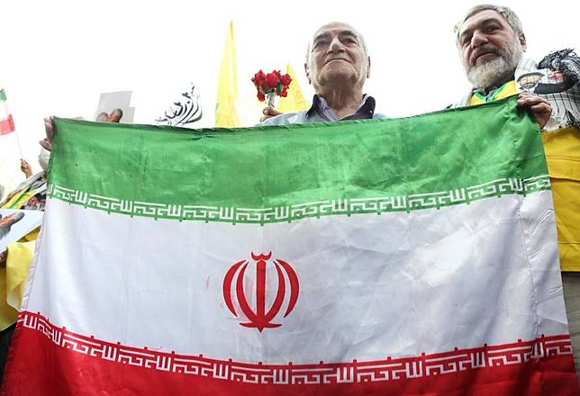 Demonstrators attend a rally in Tehran, Iran, Oct. 8, 2024. (Xinhua/Shadati)