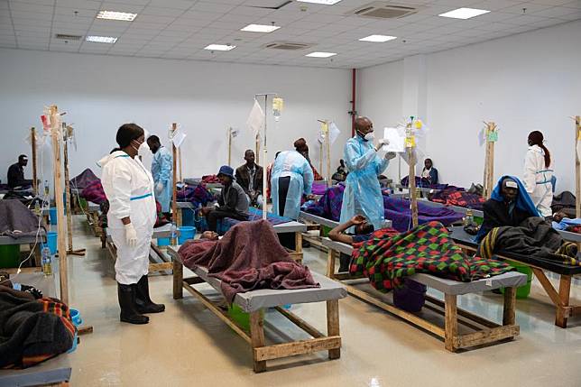 Medical workers take care of patients at the National Heroes Stadium, which has been designated as a cholera treatment center, in Lusaka, Zambia, Jan. 18, 2024. (Xinhua/Peng Lijun)