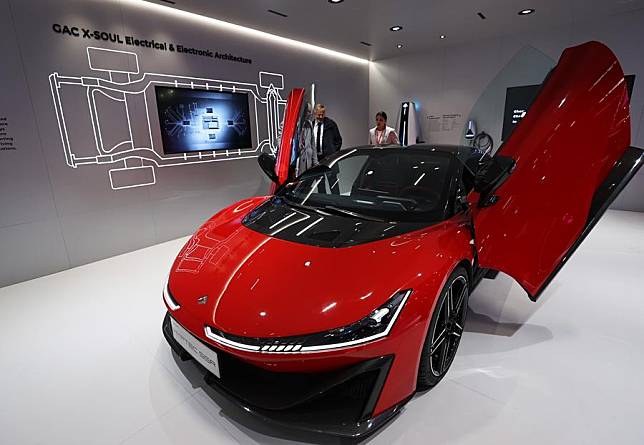 People visit the pavilion of the Guangzhou Automobile Group Co., Ltd. (GAC Group) at the 2024 Paris Motor Show during the media day in Paris, France, Oct. 14, 2024. (Xinhua/Gao Jing)