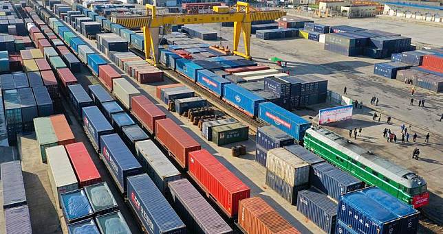 Aerial photo taken on Feb. 17, 2020 shows a China-Europe freight train fully loaded with auto parts, mechanical facilities and garments bound for Moscow of Russia and Minsk of Belarus waiting for departure at Xiangtang railway port in Nanchang, east China's Jiangxi Province. (Xinhua/Hu Chenhuan)