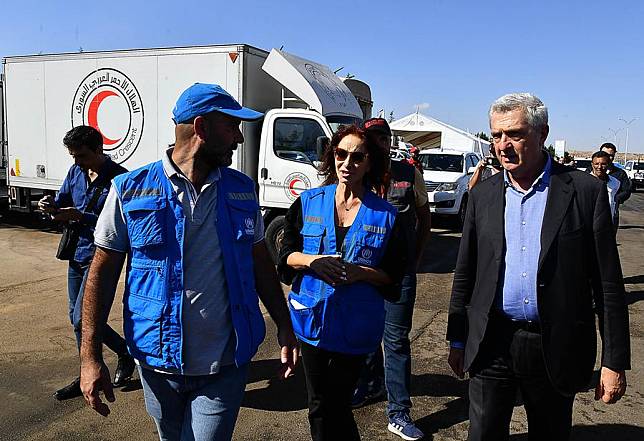 United Nations High Commissioner for Refugees (UNHCR) Filippo Grandi (1st R, Front) visits the Jdeidet Yabous crossing between Syria and Lebanon, on Oct. 7, 2024. (Photo by Ammar Safarjalani/Xinhua)