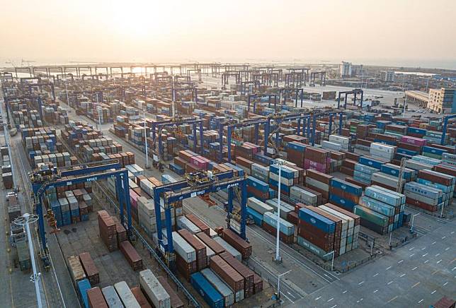 An aerial drone photo shows a view of Yangpu International Container Port in the Yangpu Economic Development Zone in Danzhou, south China's Hainan Province, Jan. 11, 2025. (Xinhua/Pu Xiaoxu)