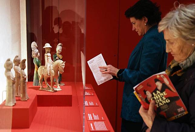 People visit an exhibition titled &ldquo;Tang China &ndash; A Cosmopolitan Dynasty (7th-10th Century)&rdquo; at the Guimet National Museum of Asian Arts in Paris, France, Nov. 18, 2024. (Xinhua/Gao Jing)