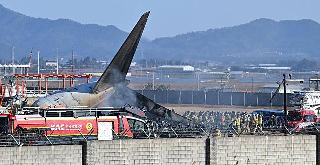 This photo shows the site of an airplane crash at an airport in Muan, southwest South Korea, on Dec. 29, 2024. (NEWSIS via Xinhua)