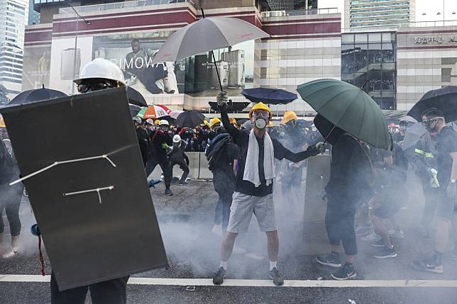 Tear gas is used on anti-government protesters after they occupy Harcourt Road in Admiralty during another day of unrest on Monday. Photo: Sam Tsang