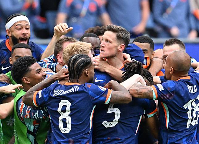 Wout Weghorst &copy; of the Netherlands celebrates scoring with teammates during the UEFA Euro 2024 Group D match between Poland and the Netherlands in Hamburg, Germany on June 16, 2024. (Xinhua/Ren Pengfei)