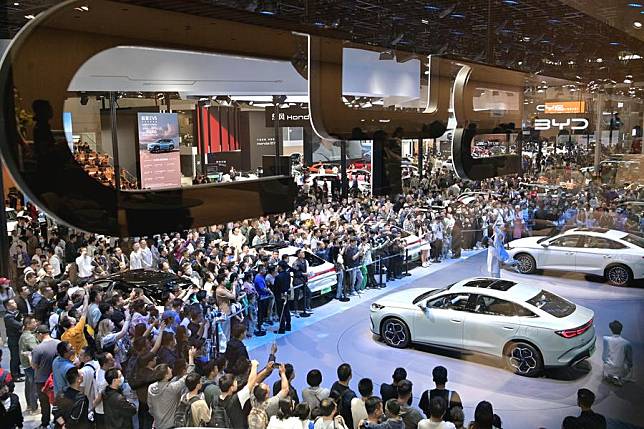 Visitors are seen at the exhibition area of Chinese NEV manufacturer BYD during the 2024 Beijing International Automotive Exhibition in Beijing, capital of China, May 4, 2024. (Xinhua/Yin Dongxun)