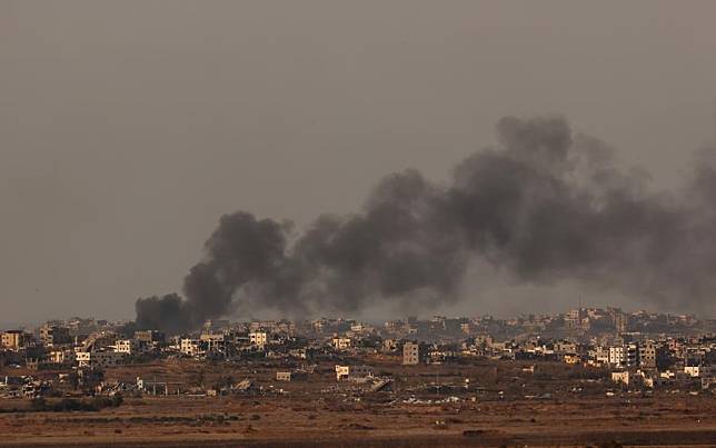 Smoke billows following Israeli strikes in the Gaza Strip, as seen from Israel's southern border with the Gaza Strip, on Dec. 22, 2024. (Photo by Gil Cohen M/Xinhua)