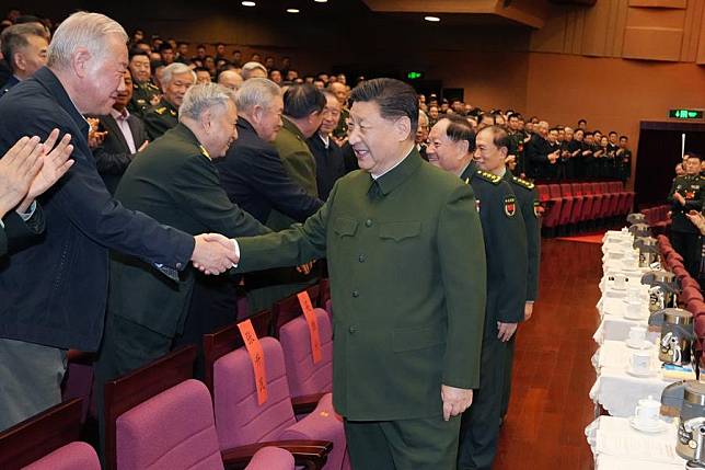 Chinese President Xi Jinping, also general secretary of the Communist Party of China Central Committee and chairman of the Central Military Commission (CMC), extends Spring Festival greetings to the country's military veterans while attending a gala held by the CMC for retired military officers of Beijing-based troops in Beijing, capital of China, Jan. 17, 2025. (Xinhua/Li Gang)