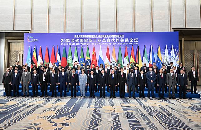 Participants of BRICS Forum on Partnership on New Industrial Revolution 2024 pose for a group photo in Xiamen, southeast China's Fujian Province, Sept. 10, 2024.(Xinhua/Lin Shanchuan)