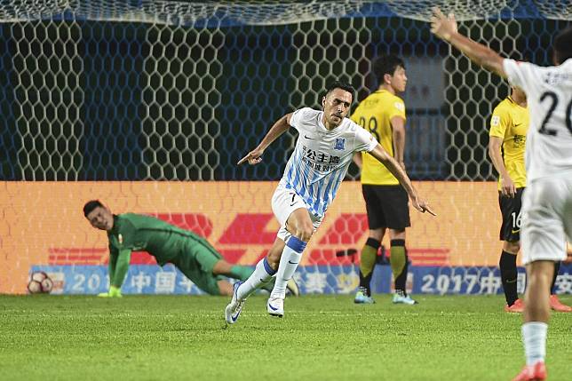 Eran Zahavi scores for Guangzhou R&F during the 2017 Chinese Super League season. Photo: Xinhua