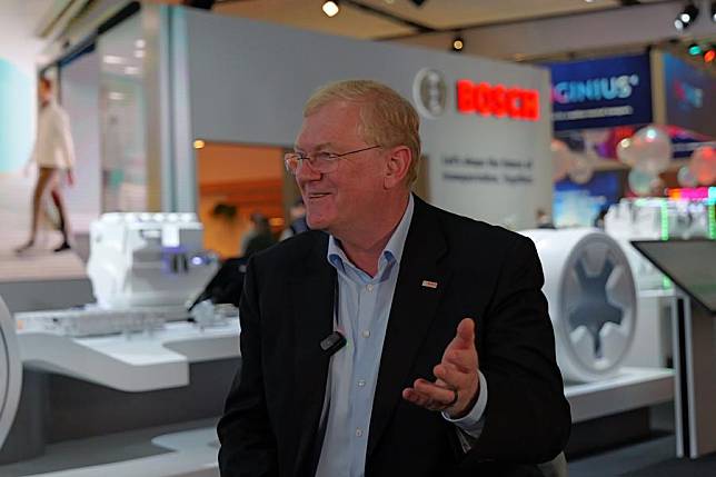 Stefan Hartung, chairman of Robert Bosch GmbH, speaks in an interview at the International Motor Show (IAA) Transportation 2024 in Hannover, Germany, on Sept. 16, 2024. (Xinhua/Jia Jinming)