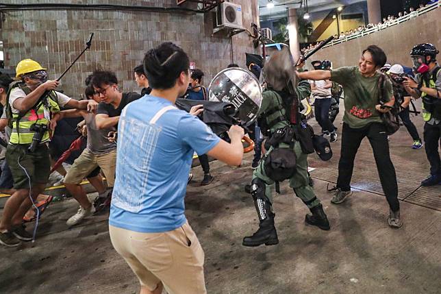 Riot police and protesters clash in Hong Kong’s Wong Tai Sin. Photo: Sam Tsang