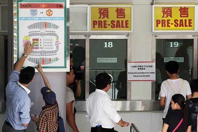 Football fans buy tickets at Hong Kong Stadium. Photo: David Wong