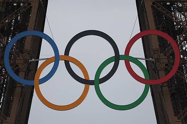 The Olympic rings are seen on the Eiffel Tower ahead of the opening ceremony of the Paris 2024 Olympic Games on July 26, 2024. (Xinhua/Gao Jing)