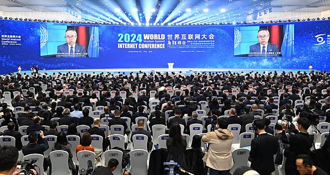 This photo taken in Wuzhen, east China's Zhejiang Province, shows Li Junhua, UN under-secretary-general for economic and social affairs, addressing the opening ceremony of the 2024 World Internet Conference (WIC) Wuzhen Summit via video link on Nov. 20, 2024. (Xinhua/Li He)