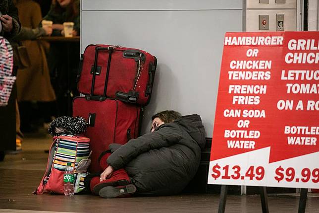 A homeless person is pictured in New York, the United States, Dec. 23, 2023. (Photo by Michael Nagle/Xinhua)