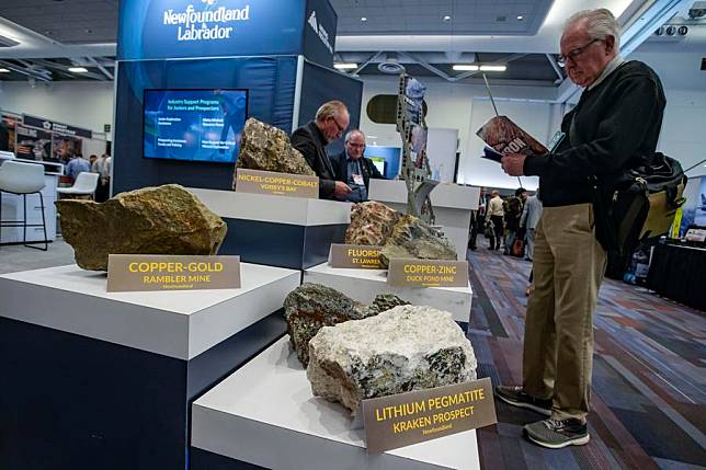 Mineral samples are displayed at a trade show of the Association for Mineral Exploration's Roundup 2024 in Vancouver, British Columbia, Canada, on Jan. 22, 2024. (Photo by Liang Sen/Xinhua)
