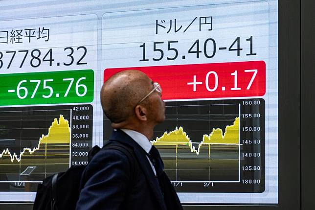 An electronic screen shows the real-time exchange rate of the Japanese yen against the U.S. dollar in Tokyo, Japan, April 25, 2024. (Xinhua/Zhang Xiaoyu)