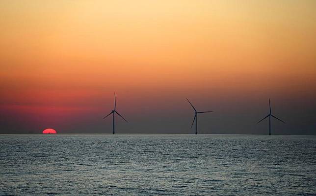 Offshore wind turbines are pictured in the waters of Laizhou City, east China's Shandong Province, Jan. 7, 2025. (Xinhua/Xu Suhui)