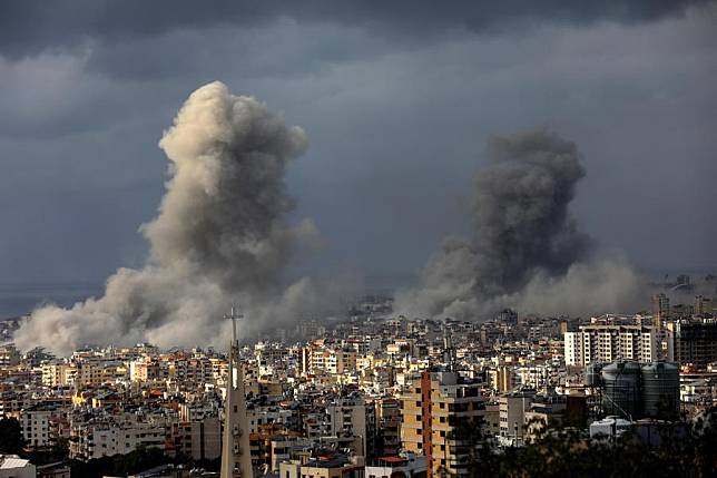 Smoke rises following Israeli airstrikes in the southern suburb of Beirut, Lebanon, Nov. 25, 2024.(Str/Xinhua)