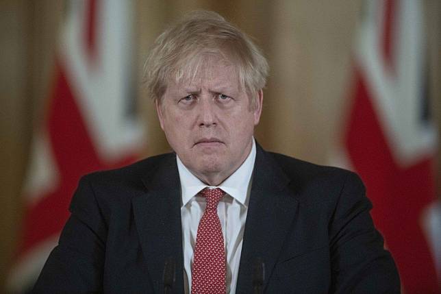 Boris Johnson was boasting, until recently, about swanning around “shaking hands with everybody”. Now he has Covid-19. Photo: EPA
