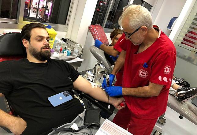 A man donates blood for those wounded in pager explosions in Beirut, Lebanon, on Sept. 17, 2024. Eight people were killed, and over 2,800 others, including Hezbollah members, were wounded on Tuesday in different areas of Lebanon as their pagers exploded, said Lebanese Health Minister Firas Abiad. (Xinhua/Bilal Jawich)