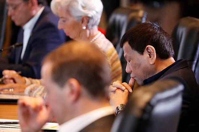 Philippines' President Rodrigo Duterte attends the retreat session of the APEC Summit in Port Moresby, Papua New Guinea