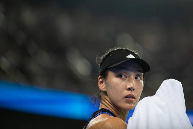 Wang Xinyu of China reacts during the women's singles semifinal against her compatriot Zheng Qinwen at the 2024 Wuhan Open tennis tournament in Wuhan, central China's Hubei Province, on Oct. 12, 2024. (Xinhua/Xiao Yijiu)