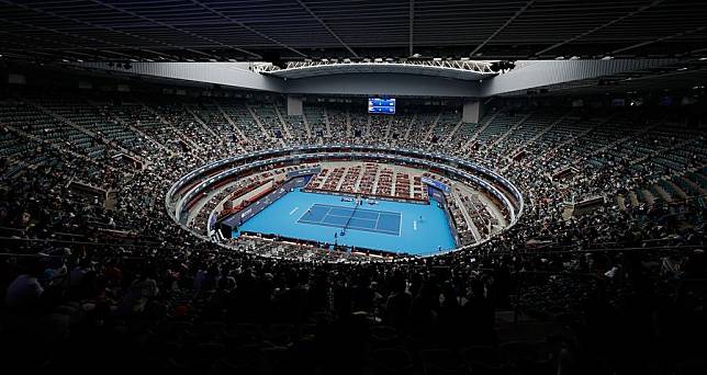 Spectators watch the men's singles 2nd round match between Roman Safiullin of Russia and Jannik Sinner of Italy during the 2024 China Open tennis tournament in Beijing, capital of China, Sept. 28, 2024 . (Xinhua/Wang Lili)