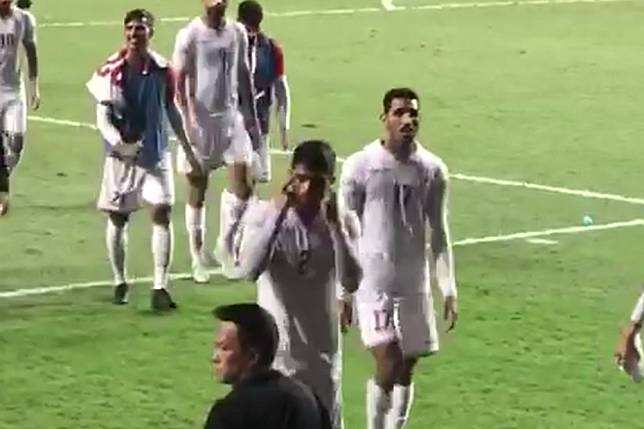 Bahrain’s Sayed Baqer appears to aim a racist gesture at Hong Kong supporters after a fractious ending the their World Cup qualifying match. Photo: Twitter/@pjrydo