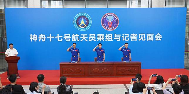 Astronauts Tang Hongbo &copy;, Tang Shengjie &reg; and Jiang Xinlin from China's Shenzhou-17 crewed mission meet press in Beijing, capital of China, July 5, 2024. (Photo by Wang Xiayang/Xinhua)