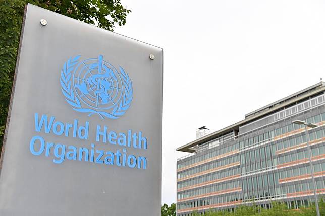 This photo taken on May 21, 2023 shows the logo of the World Health Organization (WHO) with the WHO headquarters in the background in Geneva, Switzerland. (Xinhua/Lian Yi)