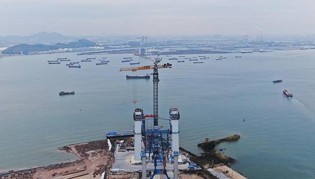 An aerial drone photo taken on Feb. 6, 2025 shows the construction site of the Shiziyang grand bridge, a major project of the Shiziyang Channel in south China's Guangdong Province. (Xinhua/Wang Ruiping)