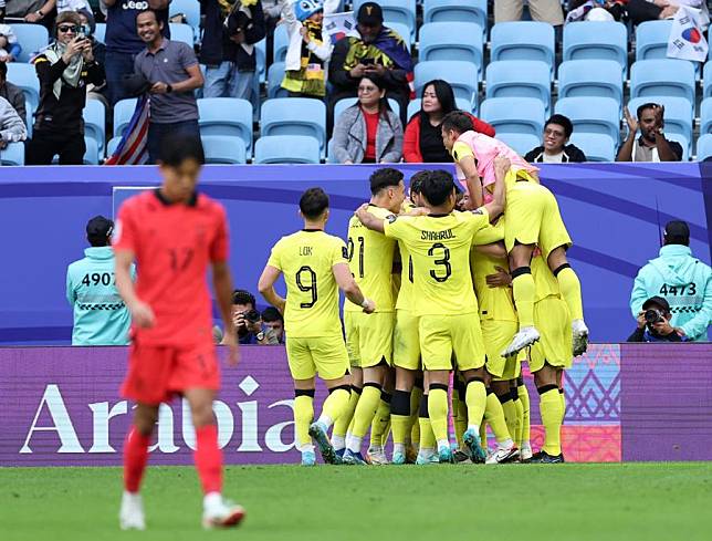 Players of Malaysia celebrate scoring during the Group E match against South Korea at AFC Asian Cup Qatar 2023 in Doha, Qatar, Jan. 25 2024. (Xinhua/Jia Haocheng)