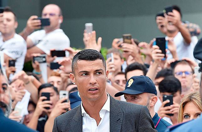Cristiano Ronaldo抵達義大利都靈。（達志影像）