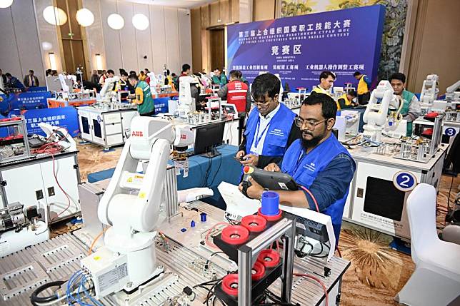 Participants compete in the third SCO Countries Worker Skills Contest in Qingdao, east China's Shandong Province, Dec. 18, 2024. (Xinhua/Li Ziheng)