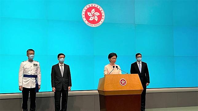 林鄭月娥(右二)公布最新政府高層調動   朱佩瑩攝