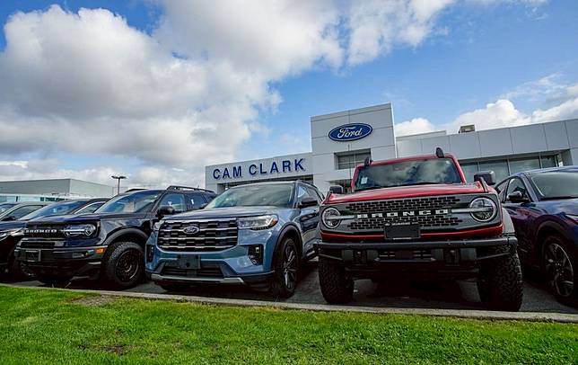 New vehicles are on display at a Ford dealership in Vancouver, British Columbia, Canada, on April 3, 2025. (Photo by Liang Sen/Xinhua)