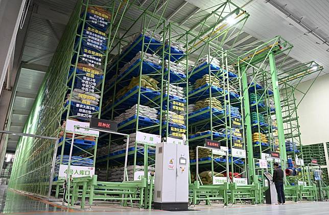 This photo taken on Nov. 4, 2024 shows the smart warehouse at M-Grass Ecological Environment (Group) Co., Ltd. in Hohhot, north China's Inner Mongolia Autonomous Region. (Xinhua/Bei He)