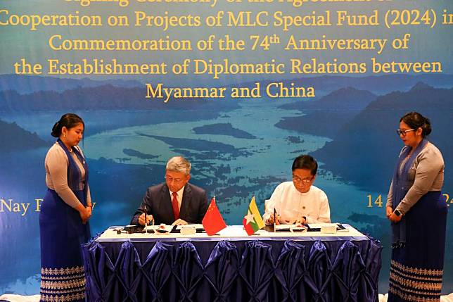 Chinese Ambassador to Myanmar Chen Hai (2nd-L) and Myanmar's Deputy Minister for Foreign Affairs U Lwin Oo (2nd-R) signed the agreement of cooperation on projects of Lancang-Mekong Cooperation (LMC) Special Fund 2024 in Nay Pyi Taw, Myanmar, June 14, 2024. (Xinhua Myo Kyaw Soe)