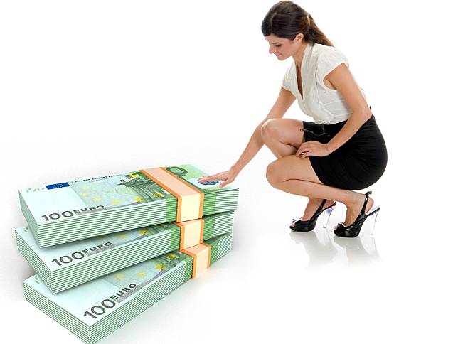 businesswoman and three dimensional bundles of europian currency