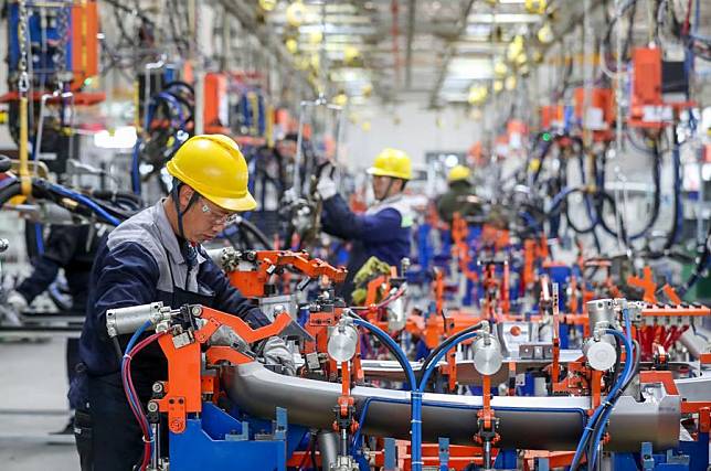 Employees work at a workshop of an automobile enterprise in Guiyang, southwest China's Guizhou Province, Dec. 11, 2024. (Photo by Yuan Hongfu/Xinhua)