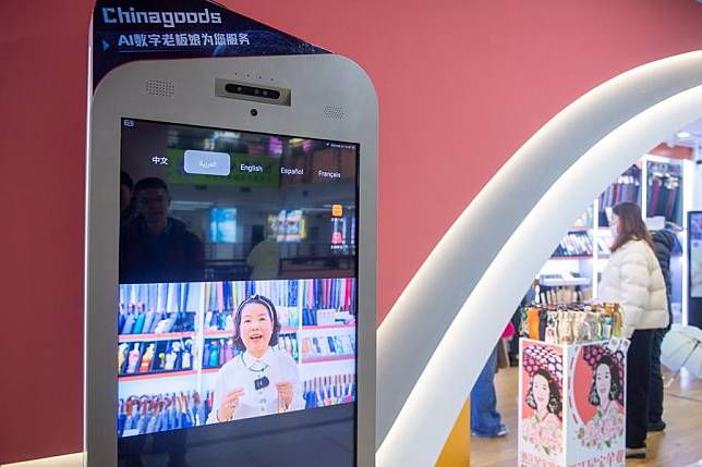 This photo taken on Feb. 21, 2024 shows a multilingual product introduction video using AI technology at Yiwu International Trade Market in Yiwu, east China's Zhejiang Province. (Xinhua/Jiang Han)